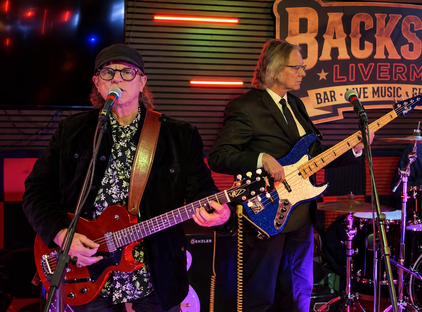 The guitarist and bassist performing on stage at Backstage Livermore